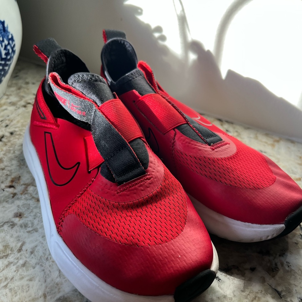 Nike Kids Red and Black Slip-On Sneakers